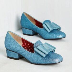 But Another Innocent Tale Blue Glitter Loafers